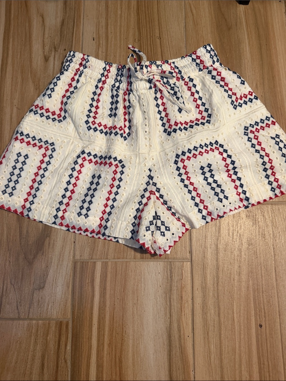Hill House Ivory Eyelet High-Waist Shorts with Red & Navy Geometric Embroidery